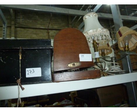 Small black metal trunk with key, a sewing machine, a brass table lamp and a metal and glass twin table lamp (4) 