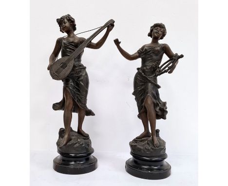 Pair of spelter figures of ladies playing musical instruments, stamped 'TR Richard' Condition ReportThe height of the figure 