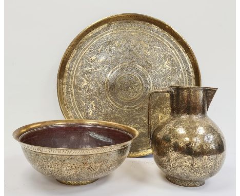 Eastern brass tray-top table ( without stand) and a 19th century Eastern brass jug and basin 