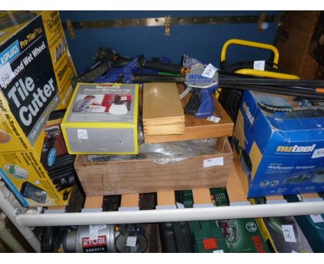 Plasplugs diamond wet wheel electric tile cutter, a workshop heater and various other carpentry tools including a set of Marp
