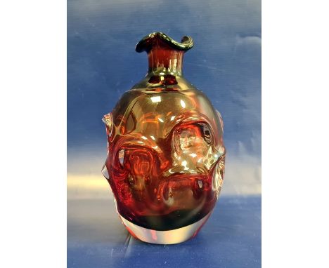 Ruby red Art glass of Whitefriars 'Knobbly' type, of bottle-shaped form with petal-shaped everted rim, 18cm high Condition Re