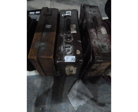 Two vintage leather suitcases, one with various travel labels, another suitcase and two boxes of ceramics and collectables in