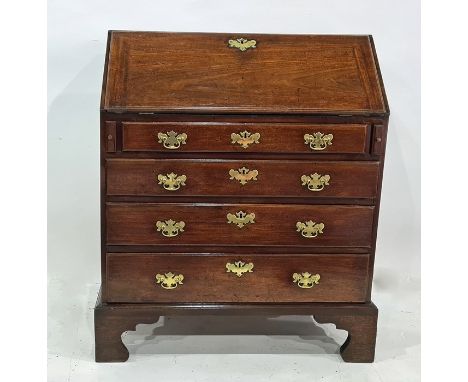 Georgian mahogany bureau with four long drawers, raised on bracket feet, brass handles and escutcheons, 91cm x 110cmCondition