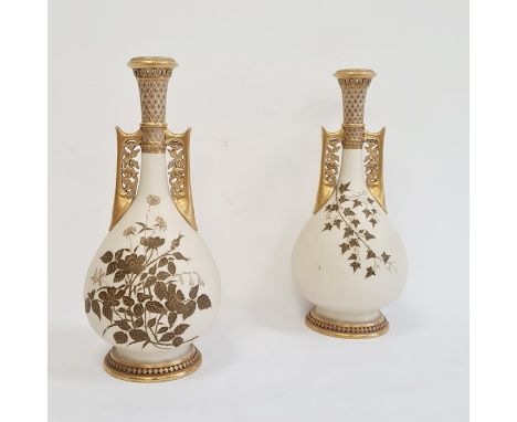 A Pair of Royal Worcester ivory ground Persian-style vases, of baluster shape with elongated necks, floret pierced bands to t