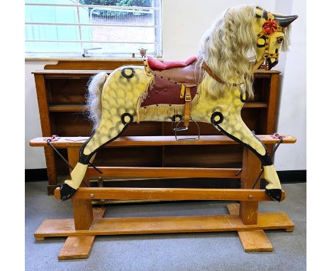 Rocking horse with painted carved wooden body, horse hair mane and tail on pine base&nbsp;