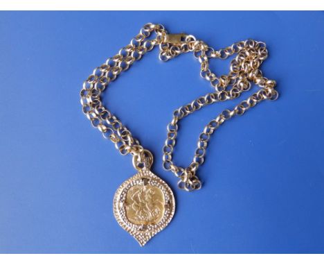 A 1918 sovereign in mount on chain.
