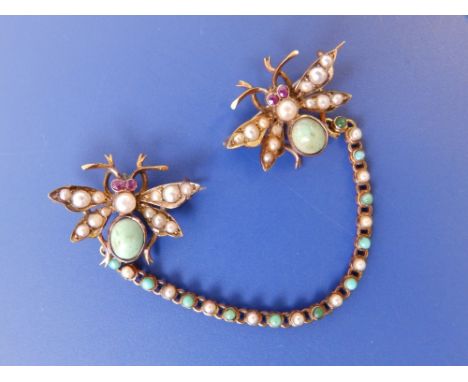 A 15ct gold scarf chain, having bee pins to either end set with pearls &amp; turquoise.
