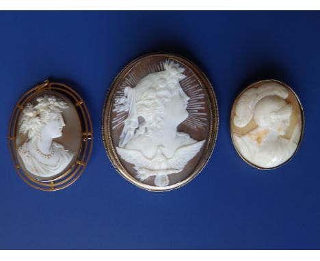 Three oval cameo brooches – classical portrait subjects.