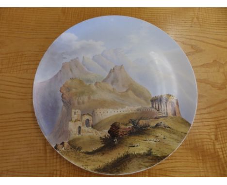 A Victorian cold-painted ceramic charger painted by Baring-Gould with a view of the Amphillsake of Taormina, Sicily, bearing 