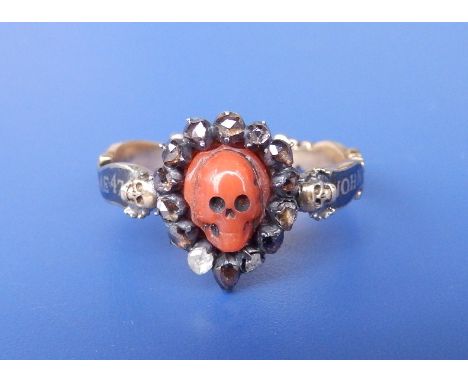 A coral & diamond set 18thC style mourning ring in yellow metal, the pendeloque setting with a coral skull surrounded by rose