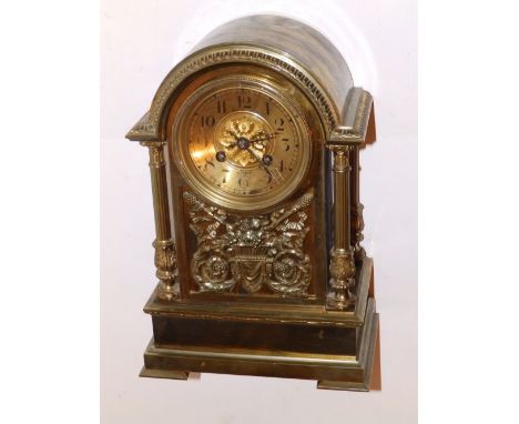 A 19thC gilt metal striking mantel clock by Japy Freres.