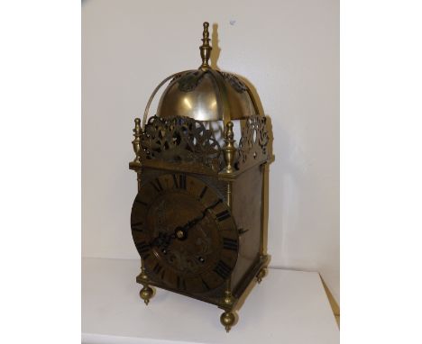 A 20thC brass striking lantern clock by Winterhalder & Hofmeier – retailed by Edwards & Sons, Glasgow, 15” high.