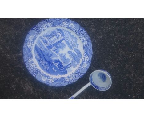 Eight Copeland Spode Italian pattern blue & white chargers and a ladle. (9)