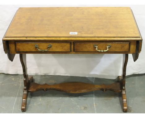 20th century burr walnut sofa table of small proportions with drop ends and two drawers, 104 x 42 x 51 cm H. Not available fo