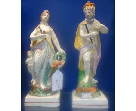 A PAIR OF 19TH CENTURY ENGLISH CERAMIC FIGURES, modelled as Venus and Neptune painted in polychrome, paper label to verso "Ev