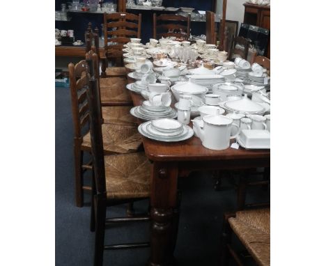 A MATCHED SET OF RUSH SEATED LADDER BACK CHAIRS, including two carvers (12)