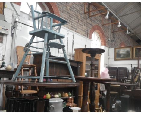 A VICTORIAN OAK TRIPOD OCCASIONAL TABLE, two others similar, and a George II style torchere