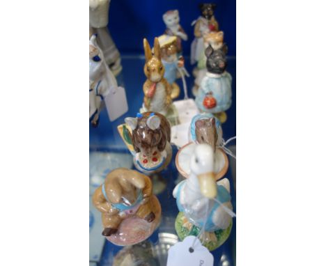 A COLLECTION OF BESWICK BEATRIX POTTERS CERAMIC FIGURES, (10)