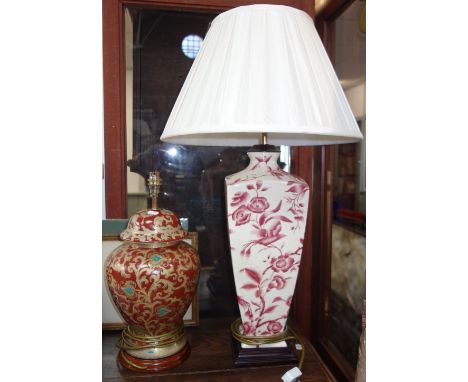 A CERAMIC LAMP OF SQUARE VASE FORM, DECORATED WITH BIRDS AND FLOWERS, with pleated cream shade, and another lamp