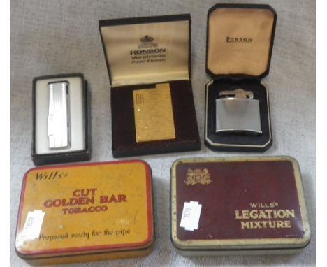 A RONSON VARATRONIC LIGHTER, ANOTHER RONSON LIGHTER, A JAPANESE LIGHTER, AND TWO VINTAGE TOBACCO TINS