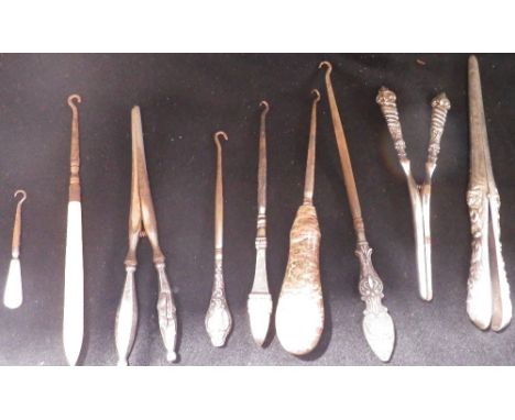 A SILVER HANDLED BUTTON HOOK and similar items