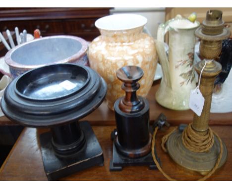 A 19TH CENTURY EBONISED WOOD TAZZA, a turned wooden stand and a brass table lamp