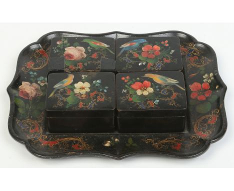 A 19th century lacquered papier mache games compendium on serpentine tray, enamelled with birds and flowers. With Cantonese m