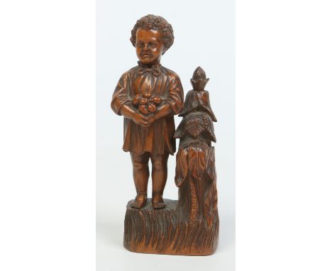 A 19th century carved treen figural sewing companion, 18cm.   Condition Report. To be used as a guide only.  Only two of four