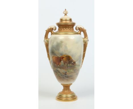 * Condition report updated. A large Royal Worcester twin handled urn and cover by John Stinton. With gilt mouldings and finel