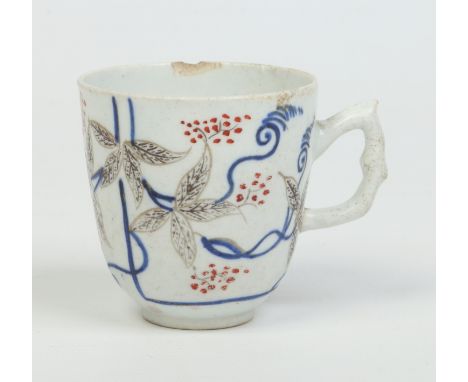 A Bow coffee cup decorated in underglaze blue, red and black enamel and gilt with trailing vines, c1755, 6.75cm.   Condition 