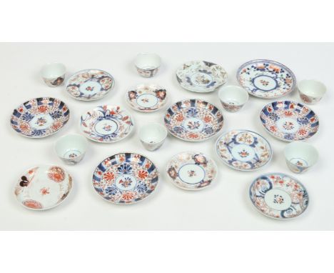 Seven Japanese Imari tea bowls and thirteen saucers c1700.   Condition Report. To be used as a guide only.  One saucer broken