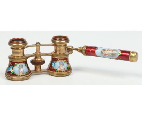 A pair of Continental 19th century lacquered brass folding opera glasses. With red enamel grounds and decorated with putti, m
