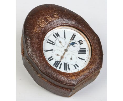 A cased Swiss nickel Goliath multi dial calendar pocket watch. The enamel dial with bold Roman numeral markers hosts four sub
