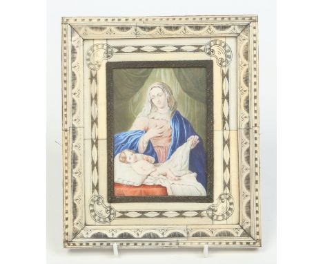 A 19th century Italian school ivory framed portrait miniature of the Madonna and Child. Signed Del Veccio, 11.25cm x 8.25cm. 