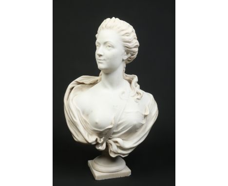 A late 18th / early 19th century carved white marble bust. Head and shoulders portrait of a maiden, her hair tied up and with