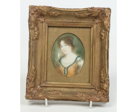 An early 20th century gilt framed portrait miniature of a young girl, 8.6cm.   Condition Report. To be used as a guide only. 