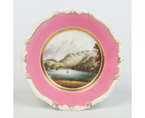 A fine Rockingham plate with gadroon, acanthus leaf and shell moulded border. With rose du barry ground, gilt band and enamel