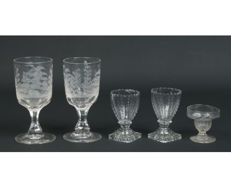 Five 19th century glasses, two etched pedestal glasses, a pair of sherry glasses on lemon squeezer bases and a pedestal sweet