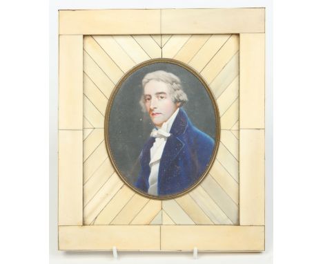 An ivory portrait miniature of a gentleman in blue coat and cravat in piano key frame. Signed Zeigler, 13cm x 10.5cm.   Condi