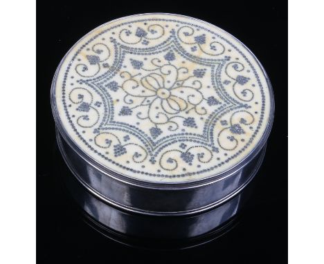 A fine Queen Anne silver and ivory circular table snuff box with piquet inlay to the top and bottom of the cover. Label insid