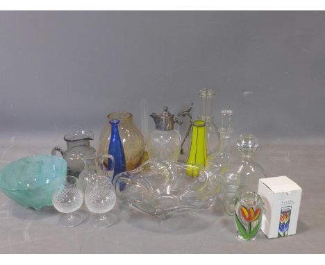 An assorted collection of glassware, to include vases, decanter, turquoise glass bowl, cut glass jug with silver plated spout