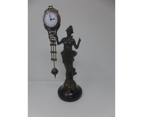 Early 20th century spelter figural mystery clock, Classical style maiden holding the circular Arabic dial above pendulum, on 