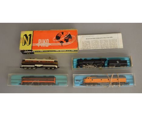 N Gauge. EX SHOP STOCK. Four boxed locomotives including an Atlas 'The Milwaukee Road', a Rivarossi #9153 Union Pacific E-8, 