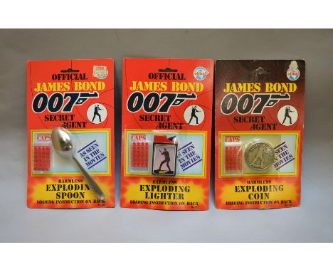 James Bond 007.&nbsp; 3 individually carded Coibel James Bond Secret Agents Gadgets from 1985 including&nbsp; Exploding Coin,