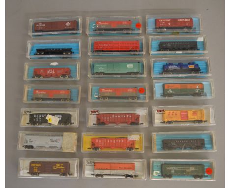 N Gauge. EX SHOP STOCK. 20 boxed items of Rolling Stock by Atlas which include 40' and 50' Box Cars, Reefers, Tank and 90 Ton