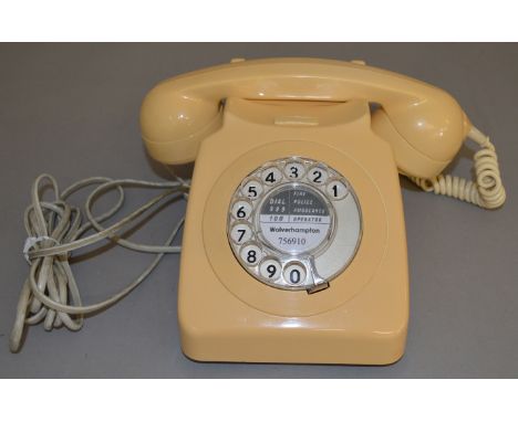 A 1970's GPO Type 746 Rotary Dial Telephone in cream, marked '746 GNA 73/1' to the underside, appears externally G+/VG, fitte