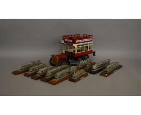 A unboxed large scale metal model of a London General Bus, approximately 40cm long and appears generally G. 10 unboxed white 