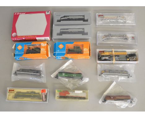 N Gauge. EX SHOP STOCK. A boxed E-R Models #81356 Baldwin RF-16 Sharknose Set, 3 boxed and four loose Atlas Loco Body Shells,