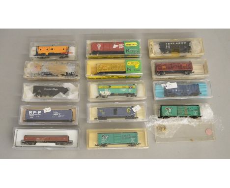 N Gauge. EX SHOP STOCK. 14 boxed items of Rolling Stock by 'Life-Like', Minitrix, Kato and others which include Flat, Box and