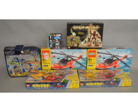 5 boxed Lego sets / games; 4403 (x2), 31314 (x2), 31390, along with 6337 Mega Bloks set and a Star Wars Lego Manual unchecked